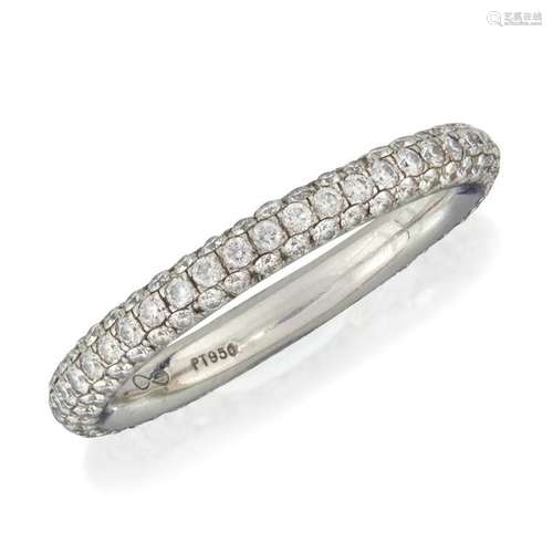 A platinum and diamond eternity band,