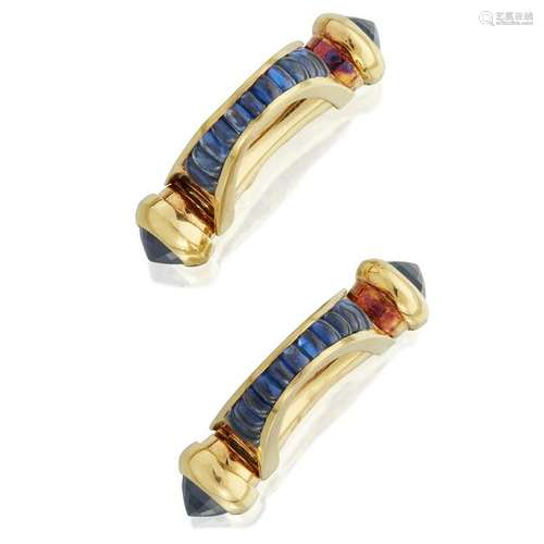 A pair of eighteen karat gold and sapphire cufflinks,