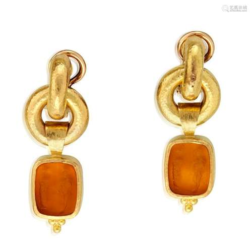 A pair of carved glass and nineteen karat gold