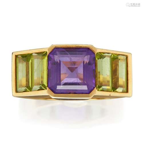 An amethyst, peridot, and eighteen karat gold ring,