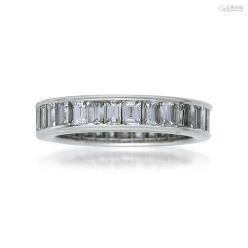 A platinum and diamond eternity band,