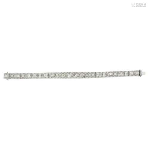 A diamond and eighteen karat white gold bracelet,