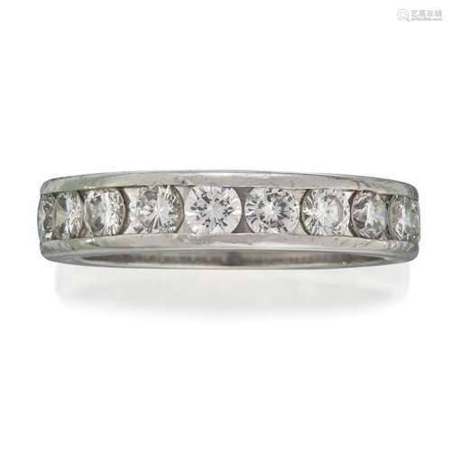 A platinum and diamond eternity band,