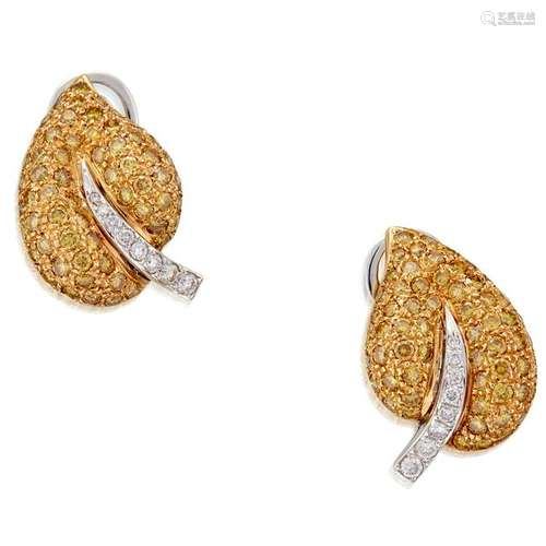 A pair of eighteen karat gold and diamond earrings,