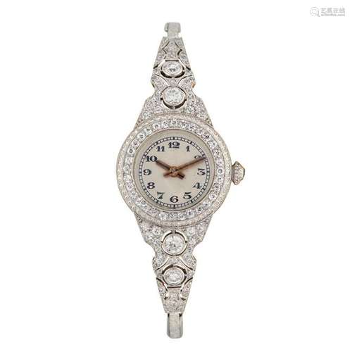 A diamond and platinum bracelet wristwatch, Jules