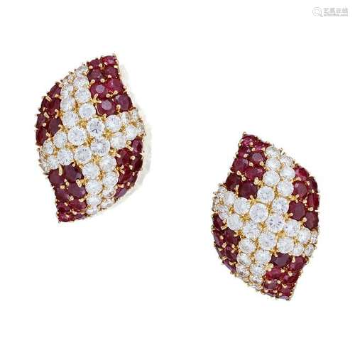 A pair of eighteen karat gold, diamond, and ruby