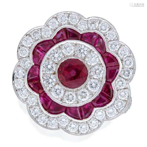 A diamond, ruby, and platinum ring,