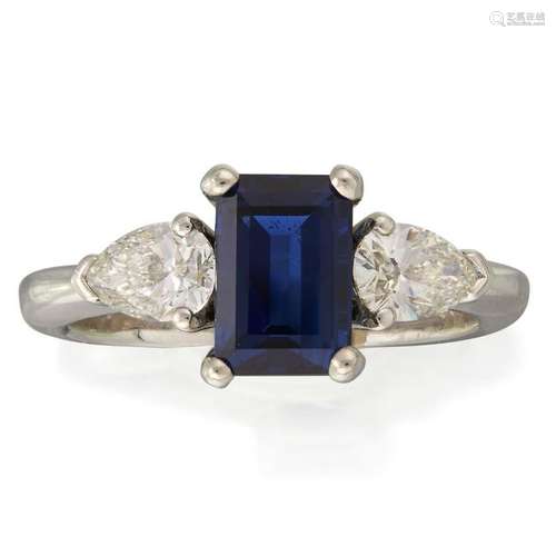 A sapphire, diamond, and platinum ring,