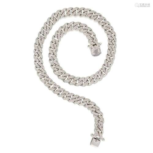 A diamond and fourteen karat white gold necklace,