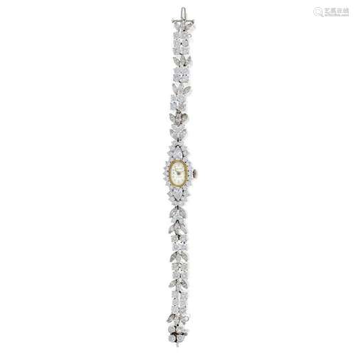 A lady's platinum and diamond bracelet wrist watch,