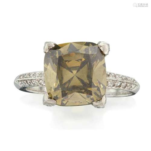 A fancy dark brown-greenish yellow diamond ring,