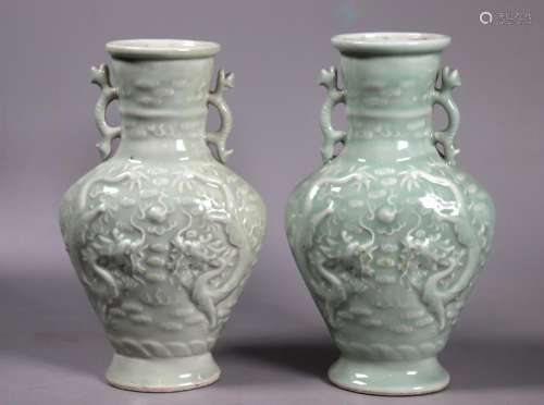 Pair Chinese Pale Celadon Molded Dragon Vases