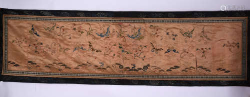 A MAUVE GROUND EMBROIDERY FRAGMENT, 19TH CENTURY