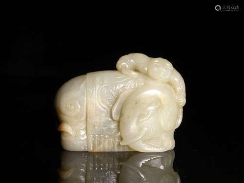 A CREAMY WHITE AND RUSSET JADE ELEPHANT CARVING, 18TH CENTURY