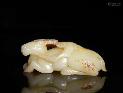 A CREAMY WHITE AND RUSSET JADE RAM, 18TH CENTURY