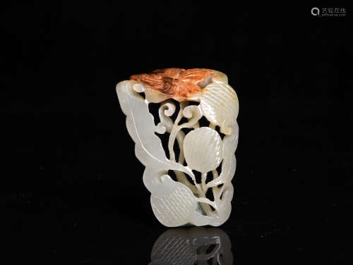 A CREAMY WHITE AND RUSSET JADE ORNAMENT, 16TH CENTURY