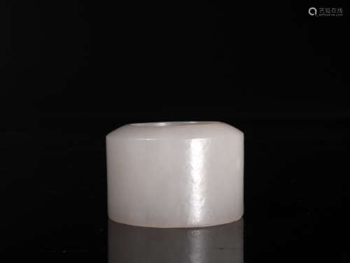 A WHITE JADE ARCHERS RING
