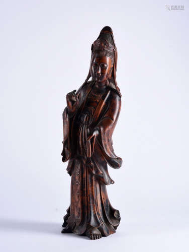 A CARVED WOODEN AVALOKITESVARA, 18-19TH CENTURY