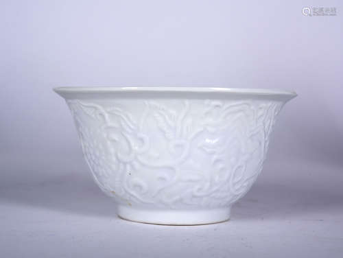 A BLANC-DE-CHINE MOLDED BOWL, KANGXI PERIOD