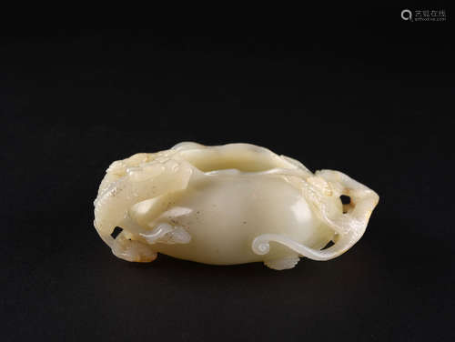 A CREAMY WHITE AND RUSSET JADE WATER CONTAINER, 18TH CENTURY