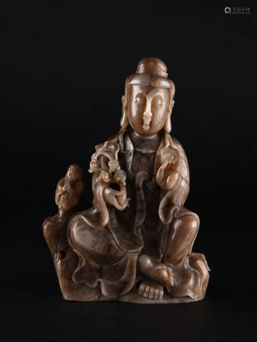 A BROWN JADE AVALOKITESVARA, 18-19TH CENTURY