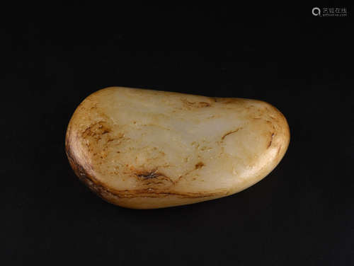 A WHITE AND RUSSET JADE BOULDER, 17TH CENTURY