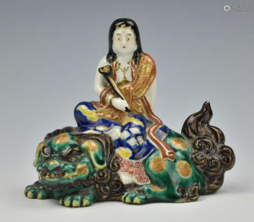 Japanese Figure Seated on a Guardian Lion,19th C.
