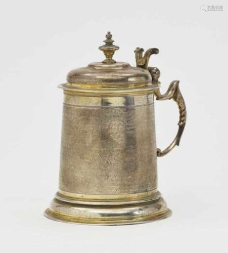 A Silver TankardAugsburg, 1663 - 1666, Abraham Mair Silver, gold-plated. Tapering cylindrical form