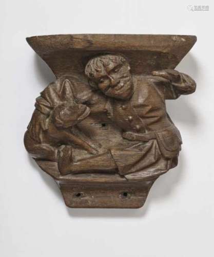 A Wall ConsoleFrance, early 16th Century Male figure with dog. Oak. Height 25 cm. Provenance: 1913