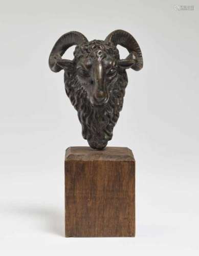 A Ram's HeadItaly, 17th Century Bronze, brown patina. Wooden base. Height 9 cm.Allegory,