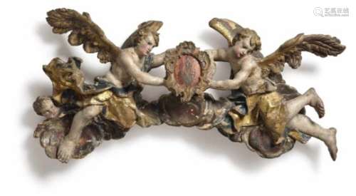 Two Angels with Armorial CartoucheSouth German, mid-18th Century Limewood, reverse flattened.