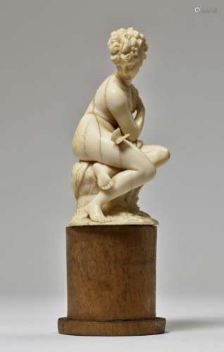 A Nymph with a ButterflyDieppe (?), late 19th Century Ivory, carved in full round. Mounted on