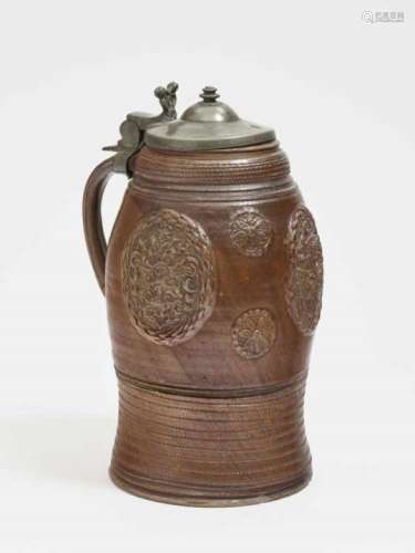 A ''Bienenkoebhumpen''Waldenburg, 17th Century Brown salt-glazed stoneware. Marked pewter cover.