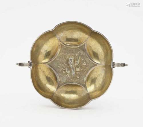A Fruit BowlBaroque style Silver, partly gilt. Hammered and chased fruit bouquets on embossed