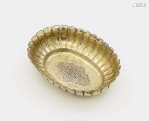 An Oval BowlAugsburg, circa 1730, Elias Adam Silver, gold-plated. Engraved leaf and strapwork