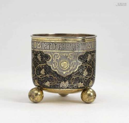 A Beaker with Ball FeetMoscow, circa 1845, master E. E. Silver, gold-plated. Niello decoration.