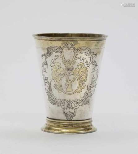 A BeakerNarva, 18th Century Silver, partly gold-plated. Frontal engraved cartouche with coat of