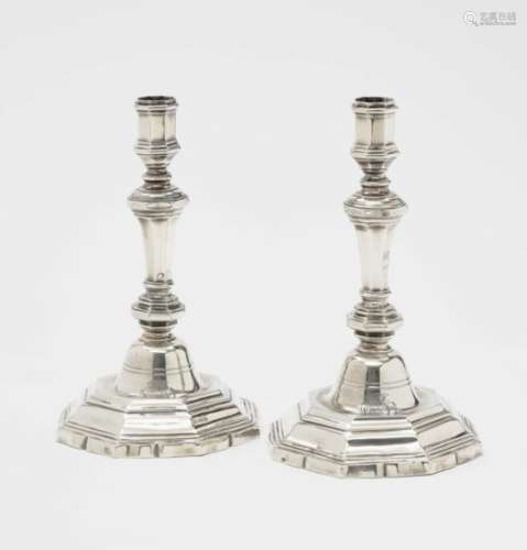 A Pair of CandlesticksParis, 1750 - 1756, master IBF (?) Silver. Engraved coat of arms with crown on