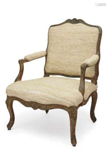 A FauteuilGerman, mid-18th Century Beechwood with remnants of polychrome painting. Relief carving.