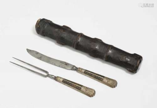 A Two-Piece Cutlery SetSouth German, 19th Century Iron blade and tines, blacksmith's mark. Horn