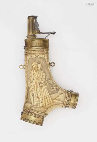An Antler Powder FlaskGerman, circa 1600 Staghorn. Gilt brass mounting, spring-loaded spout. Carved.