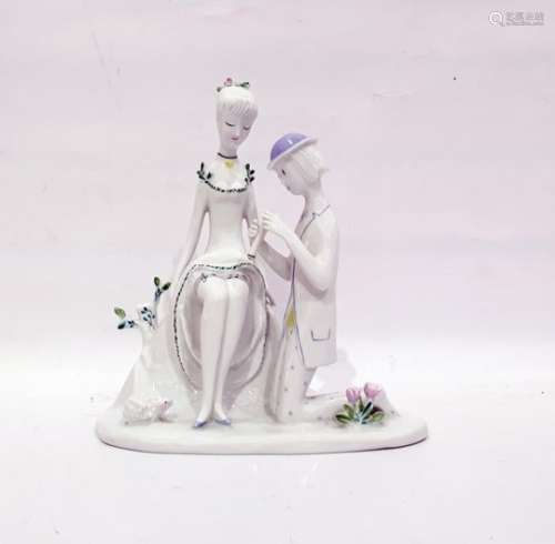 Rosenthal porcelain group of a seated girl with kneeling suitor, 22cm high