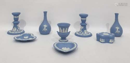 Various blue jasperware Wedgwood items, including pair of candlesticks, pair posy vases, two pin
