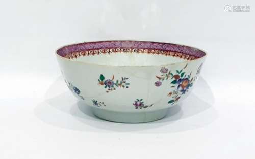 Chinese famille rose porcelain bowl with floral decoration and lattice work to border, 23cm diameter
