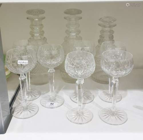 Pair of cut glass mallet-shaped decanters and stoppers, cut with a panel of diamond ornament, 27cm