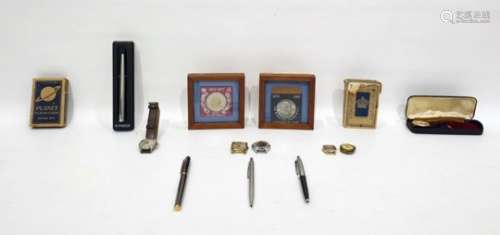 Assorted items to include playing cards, commemorative coins, pens, watches, etc