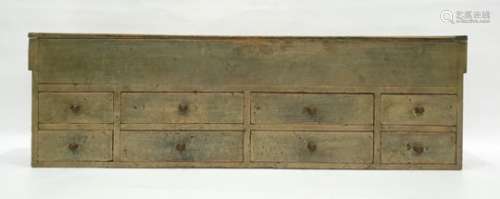 Pine chest with lift top above eight assorted drawers