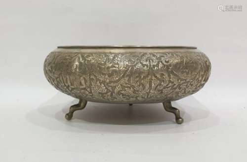 Eastern white metal circular bowl, with foliate surround, raised on cabriole feet, 25cm diameter,