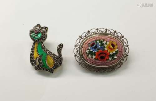 Marcasite and stained glass cat brooch and an Italian pietre dura brooch, oval with rose design