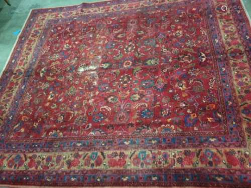 Red ground rug with allover foliate decoration, stepped border 355 cm x 300 cm